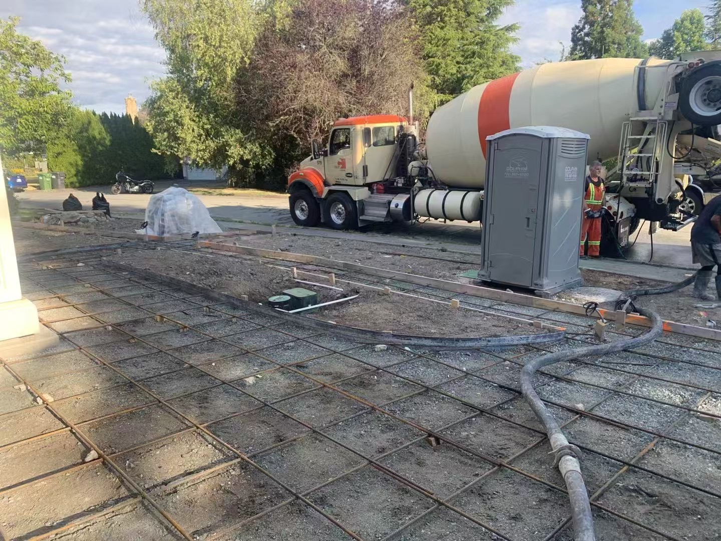 Concrete pour with rebar preparation and cement truck