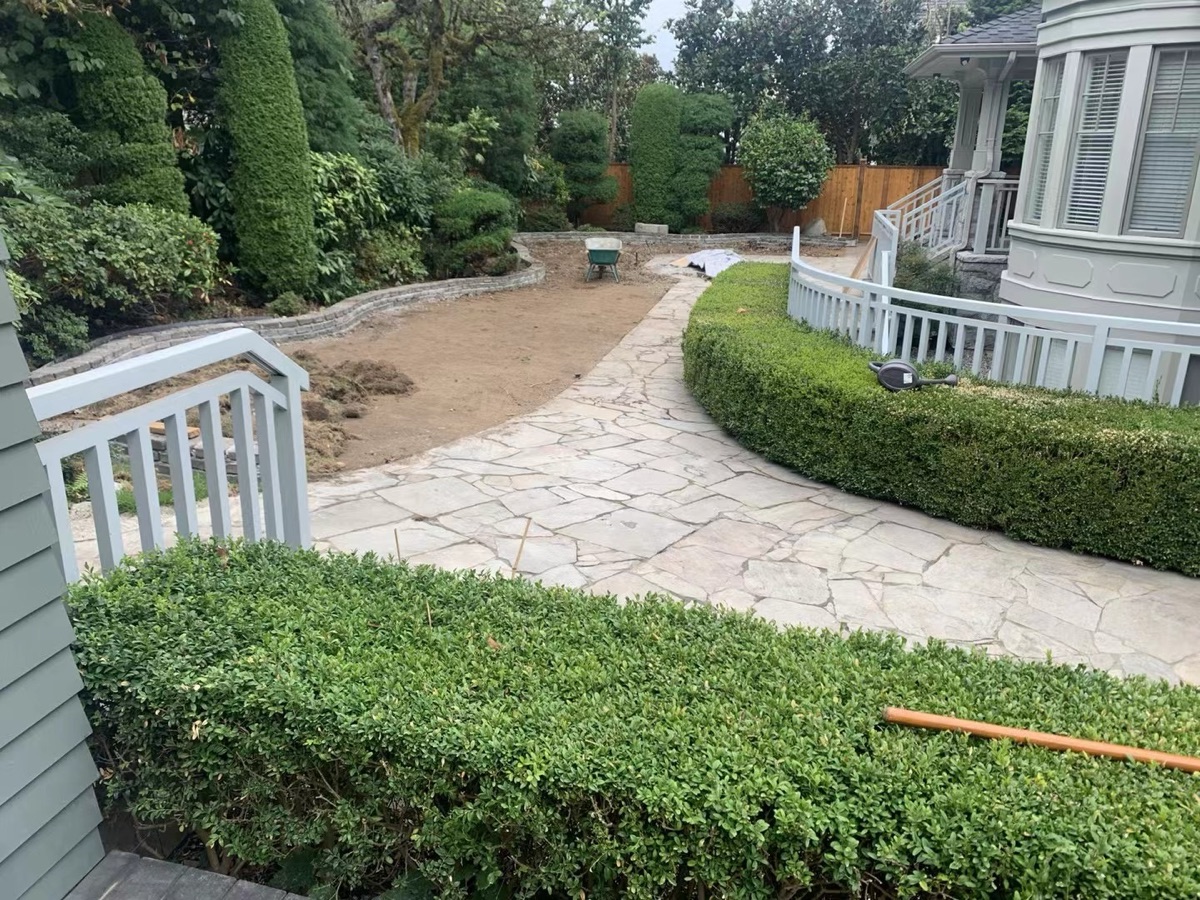 Flagstone walkway through manicured garden